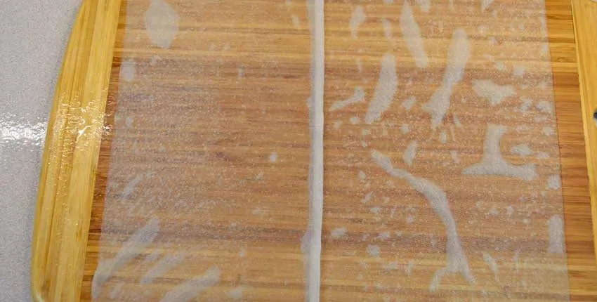 A close up of the wood grain on the wall.