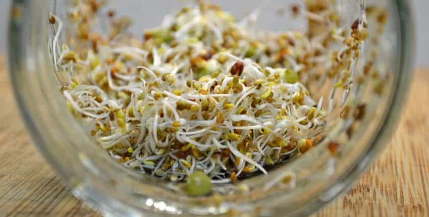 A glass container filled with food on top of a table.