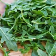 A close up of some green leaves on a plate