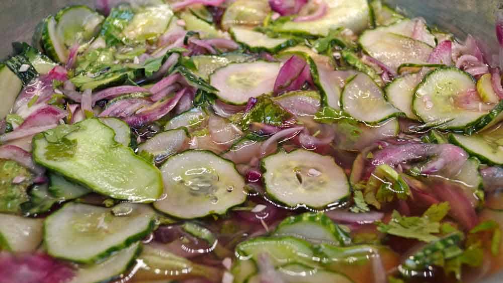 A close up of some vegetables in the water