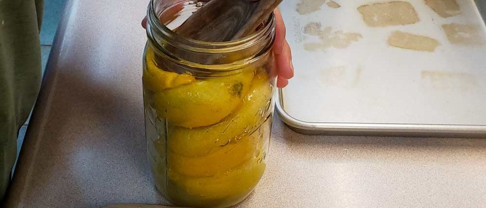 Packing Lemons Down for Preserving