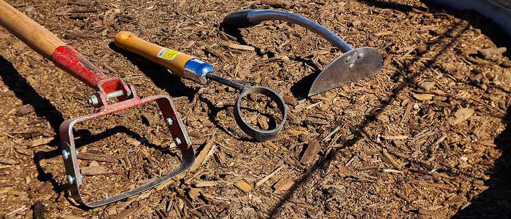 Stirrup hoe and other weeding tools